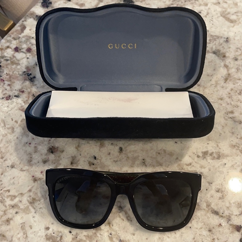 Gently used Gucci Sunglasses.